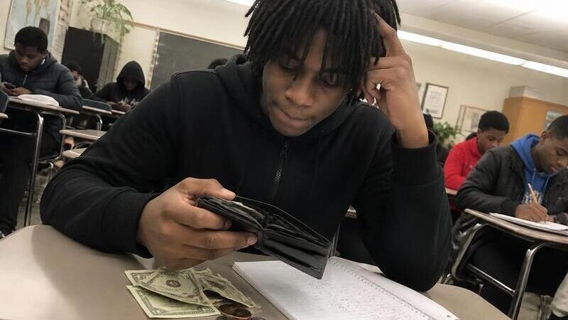 Require financial education as a core subject in schools