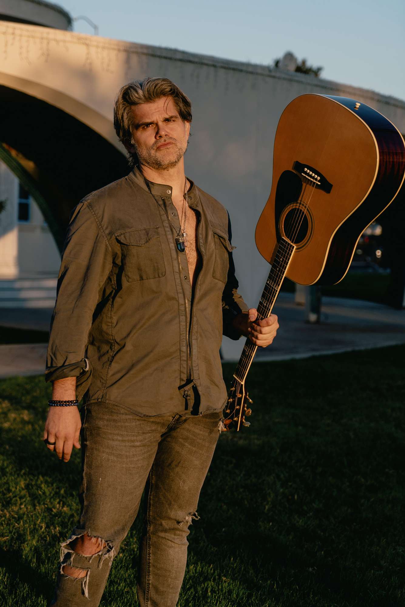 Me holding de freaking guitar upside down.