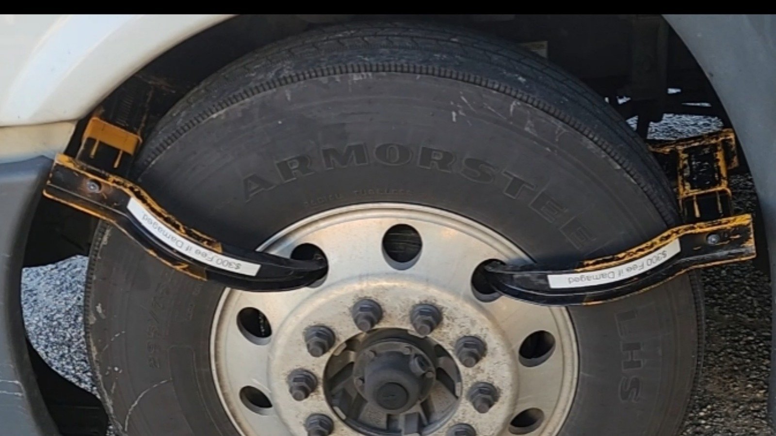 Petition · Ban "booting" or towing semitrucks when the driver is